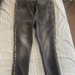 Amazing grey jeans with tan and gray leopard stitching on sides. Very sexy!